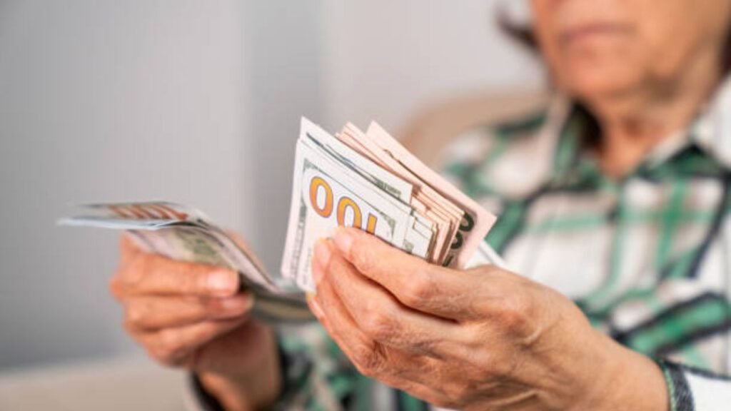 Senior Citizen With Dollar